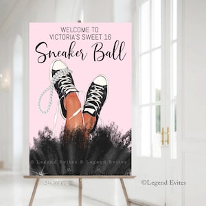 May include: A pink and black welcome sign for a Sweet 16 party. The sign says "Welcome to Victoria's Sweet 16 Sneaker Ball". The sign features a pair of black sneakers with white laces and a pearl necklace.
