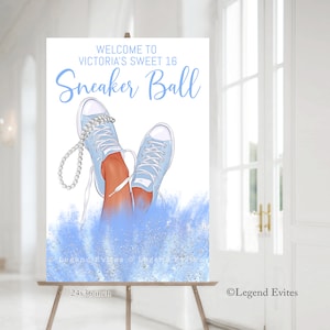 May include: A blue and white welcome sign for a Sweet 16 party with the text "Welcome to Victoria's Sweet 16 Sneaker Ball". The sign features a pair of blue sneakers with white laces and a pearl necklace. The background is a blue and white glitter design. The sign is 24x36 inches.