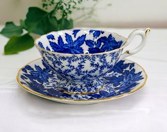 Coalport teacup and saucer set, widemouth, blue leaves with gold gilt trim, bone china, pattern Y4165, RARE