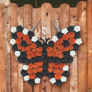 Butterfly sign made with paper cardstock