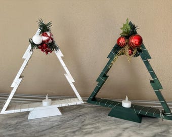 Kerstboom met bloemen en lichtjes