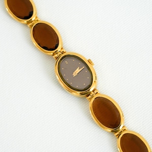 Orologio Seiko Lassale Vintage Gold, quadrante ovale marrone, bracciale, elegante stile gioiello