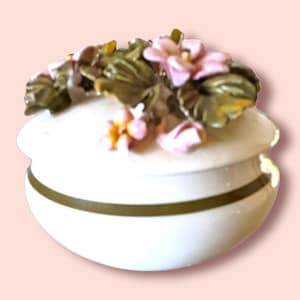 Vintage trinket box with three dimensional flowers applied, made in Italy. 3 X 3 inches,