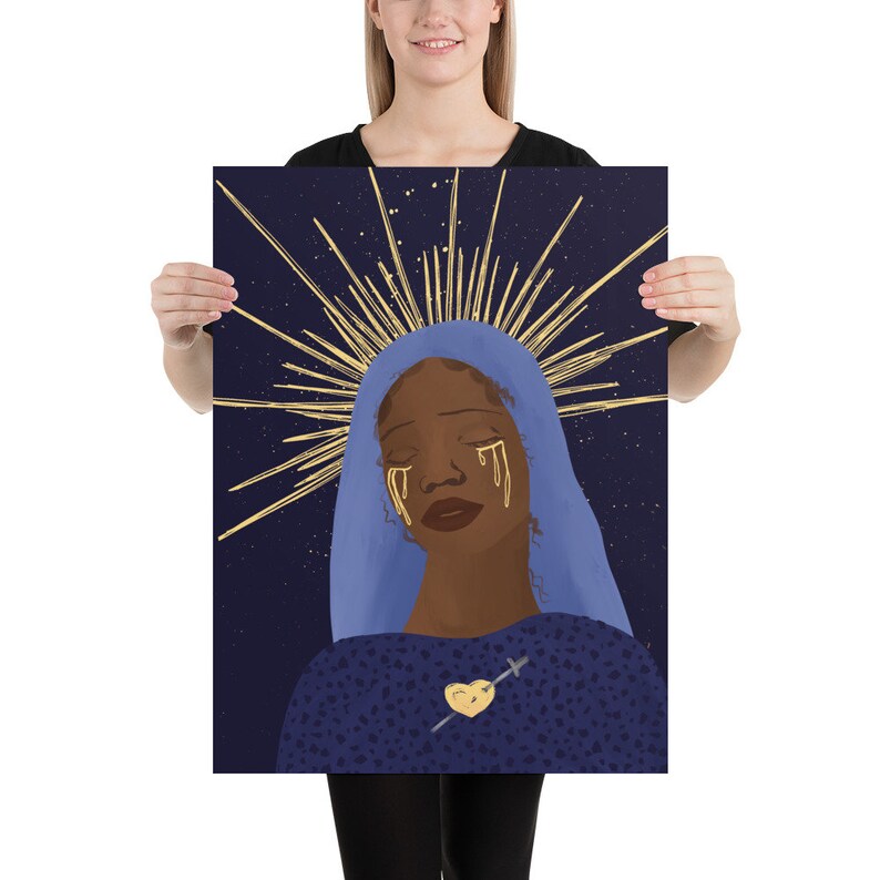 May include: A digital illustration of a woman with a halo of gold rays, wearing a blue veil and a blue and gold patterned dress. Her eyes are closed and she has golden tears streaming down her face. A gold heart with a sword through it is on her chest.