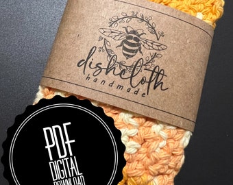 May include: A crocheted dishcloth in shades of orange, yellow, and white. The dishcloth is rolled up and tied with a brown paper band that has a bee logo and the text "dishcloth handmade". A black and white circle with the text "PDF DIGITAL DOWNLOAD" is in the foreground.