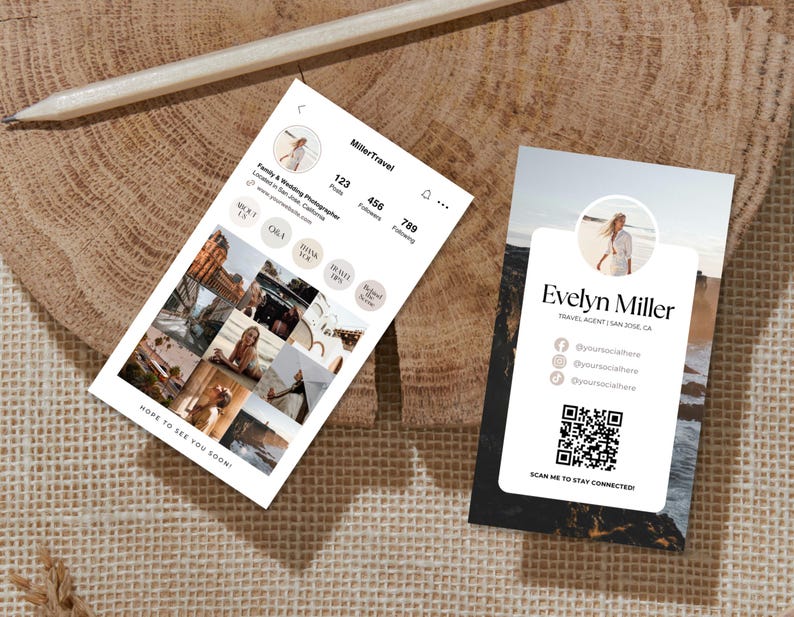 May include: Two business cards and a pencil rest on a wooden surface. One card displays a social media profile with the name "MillerTravel" and the text "Family & Wedding Photographer." The other card features "Evelyn Miller, Travel Agent."