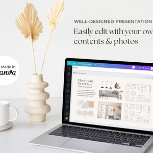 May include: A laptop computer displaying a presentation design template on the screen. The presentation is titled "Floor plan Overview" and includes a floor plan diagram, furniture, and text. The laptop is on a white table with a white mug and a vase with dried palm leaves.