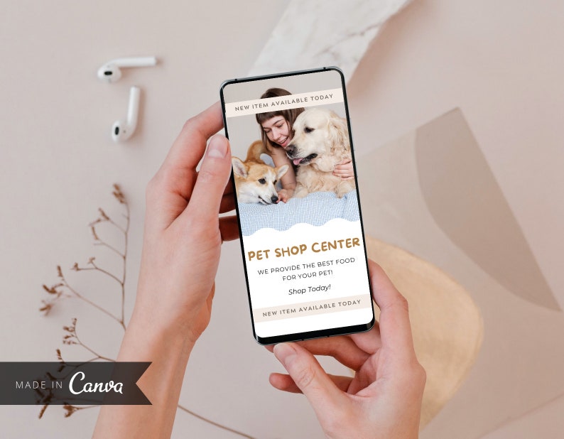 May include: A mobile phone screen displaying a pet shop advertisement with a photo of a woman and two dogs. The text reads "New Item Available Today", "Pet Shop Center", "We provide the best food for your pet! Shop Today!" and "New Item Available Today".