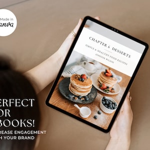 May include: A tablet displaying a digital cookbook with a chapter titled "Chapter 6 Desserts: Simple & Healthy Food Recipes" by Jennifer Wilson. The image shows a photo of pancakes with berries and nuts.