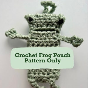 May include: A green crocheted frog pouch with black eyes. The text "Crochet Frog Pouch Pattern Only" is on a green rectangle.