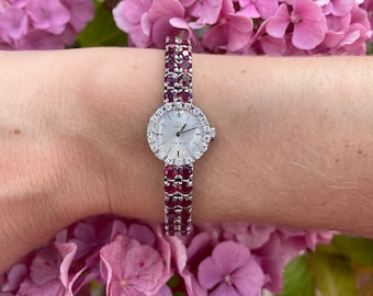 Vintage Ruby and Diamond Omega Watch  (Era: 1960s, white gold).