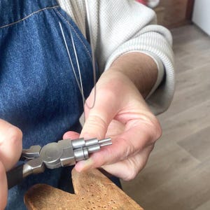 Making hooks at the work bench.