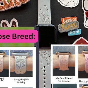 May include: A light gray Apple Watch band with dog-themed designs, including paw prints and various dog breeds. The image also shows stickers with dog-related phrases and breed options like "My Corgi" and "Happy Dachshund".