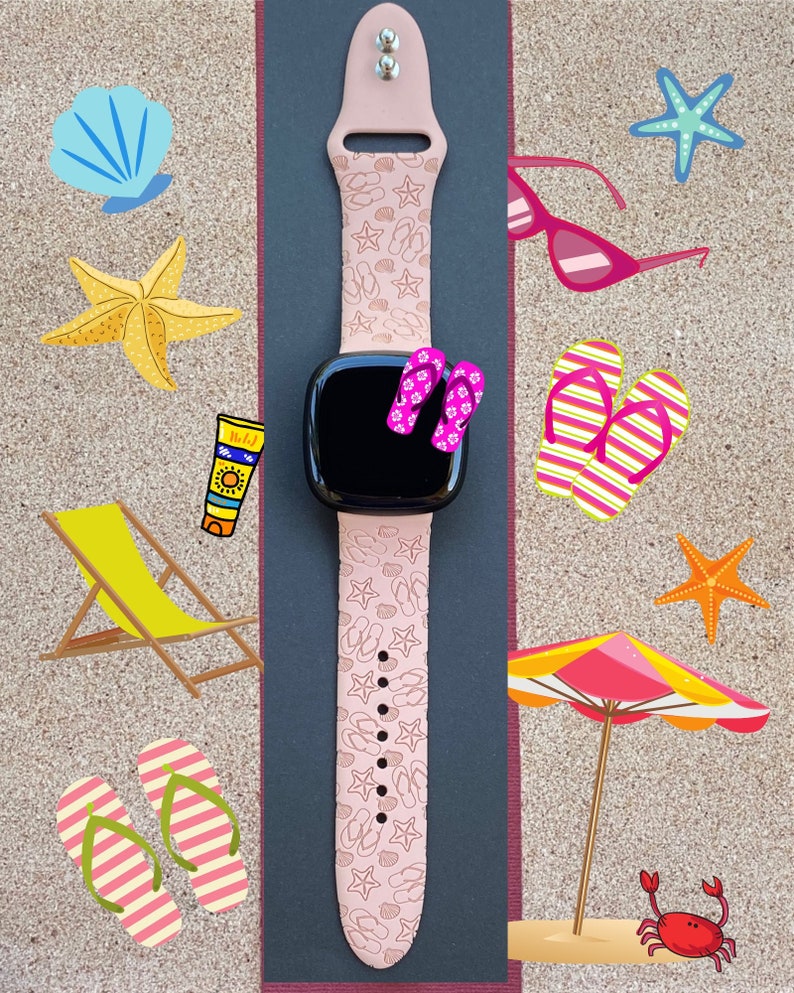 May include: A pink watch band with a white and pink seashell and flip-flop pattern. The watch band is on a dark gray background with beach-themed illustrations.
