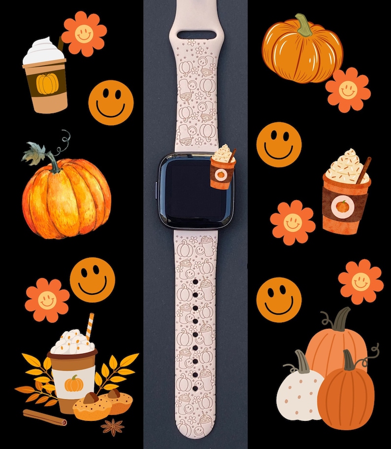May include: A pink Apple Watch band with a fall-themed design featuring pumpkins, coffee cups, and smiley faces. The band is made of silicone and has a white background with brown and orange accents.