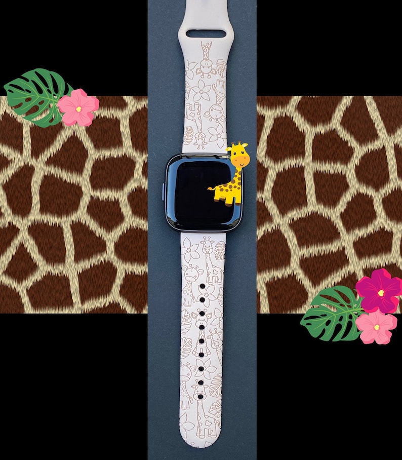 May include: White Apple Watch band with a giraffe print. The band is decorated with a pattern of giraffes, flowers, and leaves. The watch face is black.