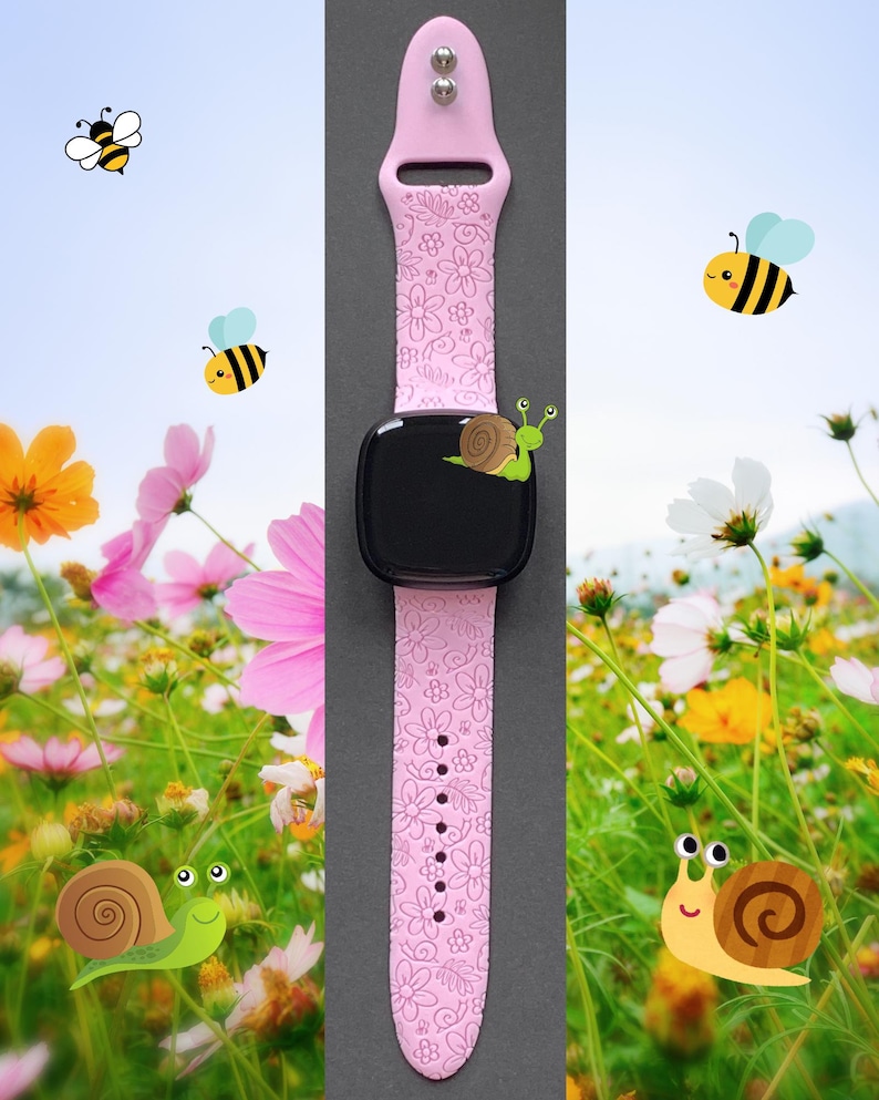 Puede incluir: Pulsera de reloj de silicona rosa con un patr&oacute;n floral. La pulsera se muestra sobre un fondo negro con una esfera de reloj y un dise&ntilde;o de caracol.