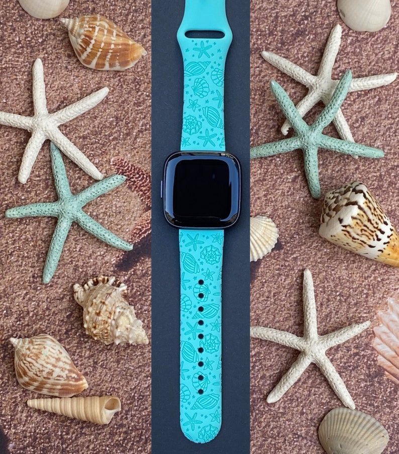 May include: A turquoise blue watch band with a seashell and starfish pattern. The band is made of silicone and is compatible with smartwatches.