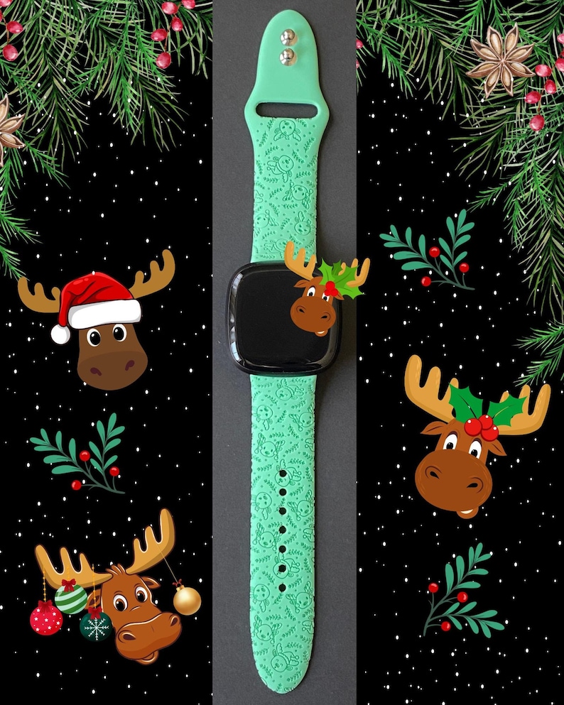 May include: A green silicone Apple Watch band with a Christmas moose pattern. The band has a black watch face with a moose illustration.