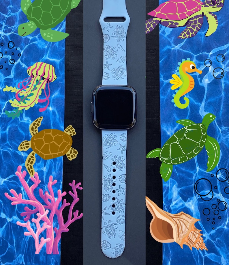 May include: A light blue silicone watch band with a sea life design. The band features sea turtles, seashells, starfish, and coral. The band is compatible with Apple Watch.