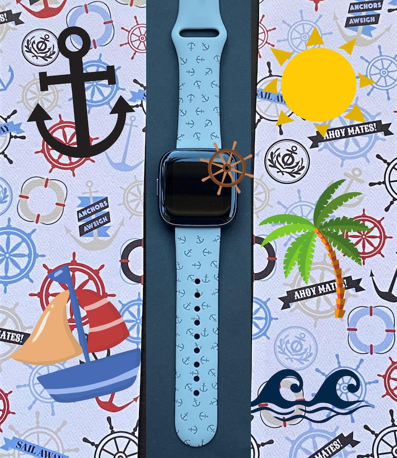 May include: A light blue Apple Watch band with a nautical anchor pattern. The band is on a white background with a nautical theme.
