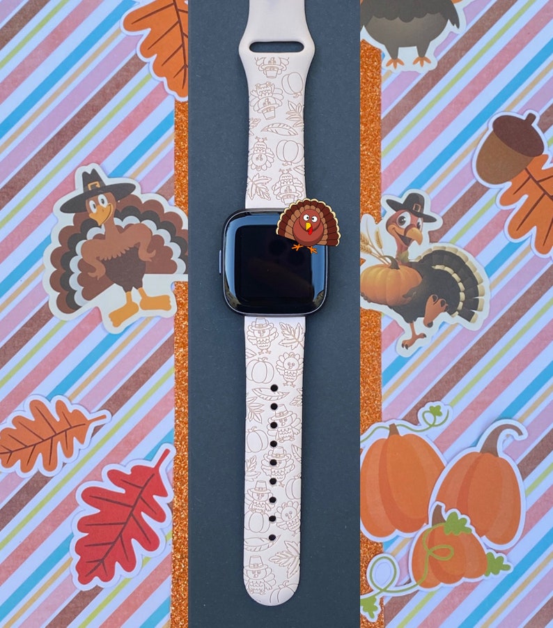 May include: White watch band with a Thanksgiving-themed design featuring turkeys, pumpkins, and leaves. The band is made of silicone and has a white background with brown and black details.