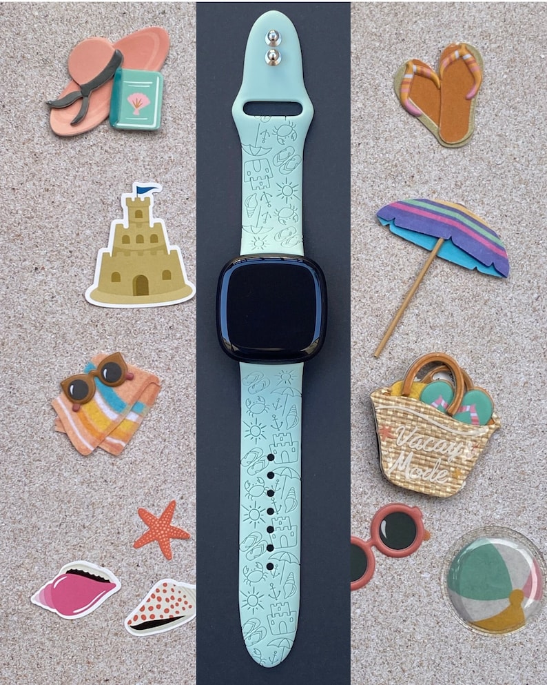 May include: A light blue silicone watch band with a white outline of beach-themed illustrations, including a beach umbrella, a sandcastle, a crab, a seashell, a surfboard, and a sun. The band is compatible with a smartwatch.