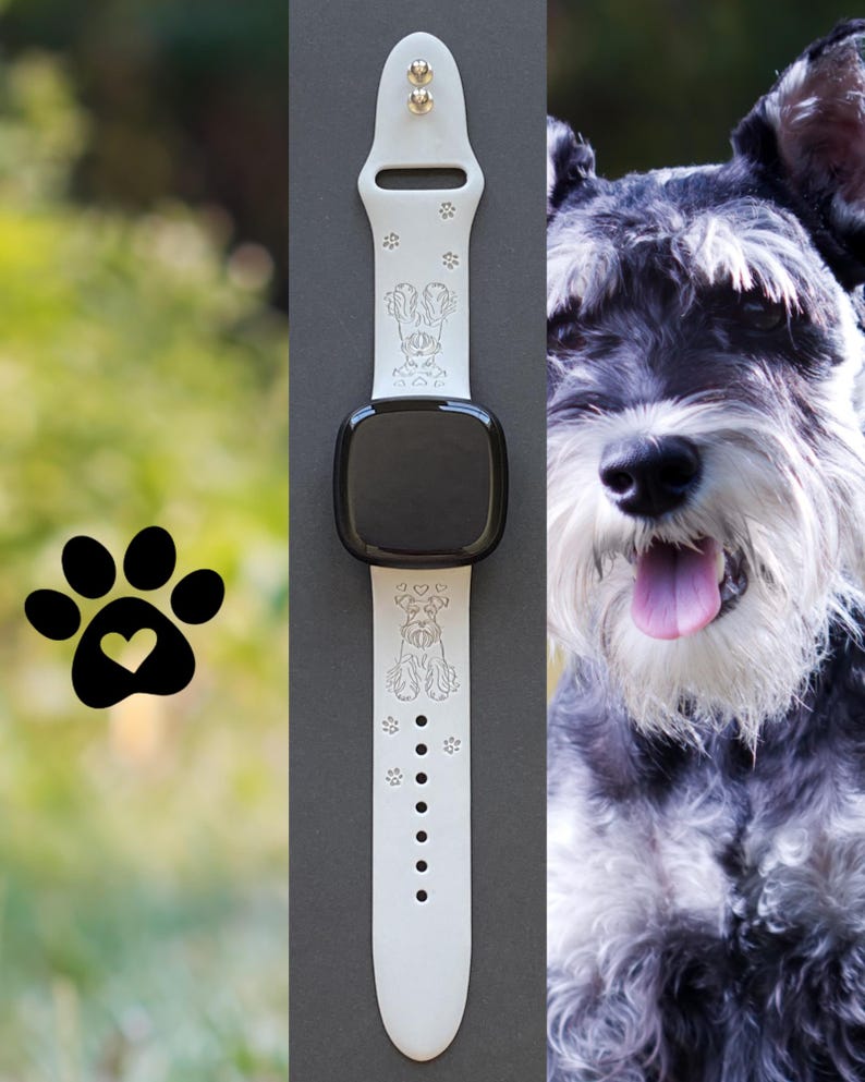 K&ouml;nnte beinhalten: Wei&szlig;es Smartwatch-Armband mit schwarzem Bildschirm. Das Armband zeigt eingravierte Pfotenabdr&uuml;cke und ein Schnauzer-Hunde-Design. Das Armband wird neben einem schwarzen Pfotenabdruck mit einem Herzen gezeigt.
