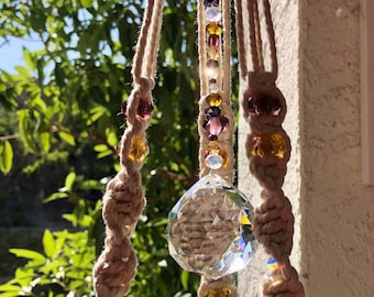 Wine at Sunset Macrame Plant Hanger with Crystal Beading in Warm Purple and Gold with a Center Crystal Prism.