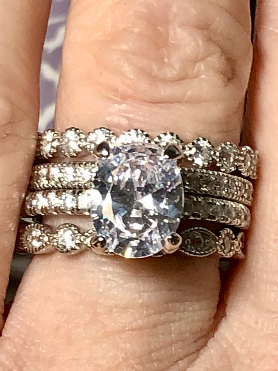 A Grand 3CT Oval Grade AAAAA Cubic Zirconia Engagement Rings