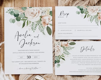 May include: Wedding invitation suite with floral accents. The invitation features the names "Amelia and Jackson" and event details. RSVP and details cards are included, all with a soft, elegant design. A wax seal and gold-colored stamp are also visible.