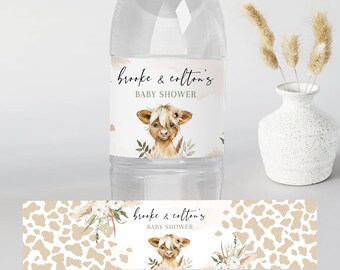 May include: Water bottle labels with a brown and white cow illustration and the text "Brooke & Colton's Baby Shower". The labels have a brown and white cow print background.