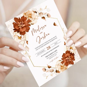 May include: Wedding invitation with a gold hexagonal frame and floral design. The invitation is for Melissa and Joshua's wedding on 28 September 2023 at 4:00 PM at The Florist's Loft in Toronto, Ontario.