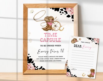May include: A printable time capsule sign featuring a pink and brown cowgirl boot, lasso, and a star. The sign reads "Time Capsule To Be Opened When Emery Turns 18". A separate card is included that says "Time Capsule Dear Emery" with lines for writing messages.