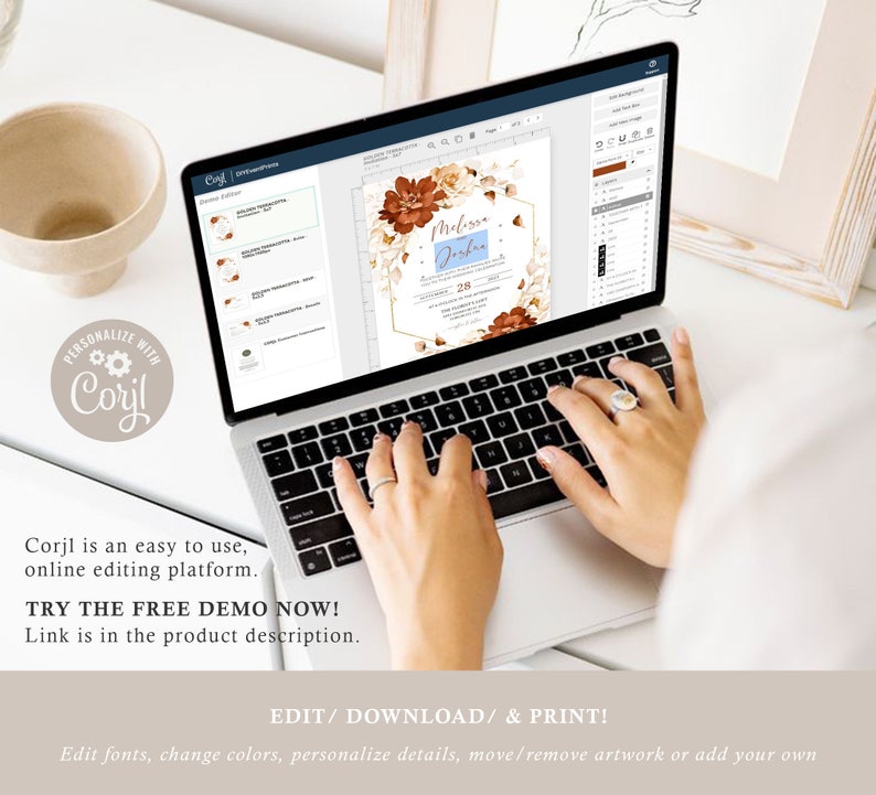 May include: A laptop computer displaying a wedding invitation template on the screen. The invitation features a floral design with brown and white flowers and a gold hexagon frame. The text on the invitation reads "Melissa & Joshua" and "28".