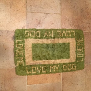 May include: Green and cream colored doormat with the text "Love My Dog" in the center and "Love Me Love My Dog" around the border.