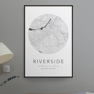 May include: Black and white map print of Riverside, California, with the city name and coordinates "33.98° N, 117.38° W" and "UNITED STATES" printed below the map.