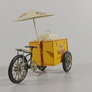 classic vehicle, completely handmade, metal ice cream cart, hand painted, metal piggy bank, collectible,
