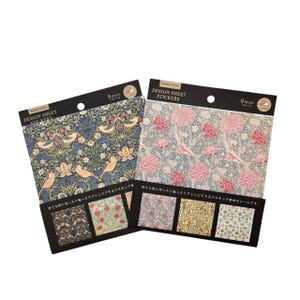 May include: Two packs of design sheet stickers. One features a blue floral pattern with birds, the other a pink floral design. Each pack includes nine sheets and smaller sample designs.