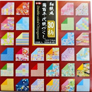 May include: A pack of 120 sheets of 7.5 x 7.5 cm double-sided Chiyogami origami paper featuring 30 distinct patterns. The packaging displays a grid of folded paper samples in various colors and designs, with text including 30 patterns.