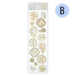 Op de afbeelding: Een vel decoratieve stickers met bloemmotieven in pastelkleuren. De stickers bevatten verschillende vormen en maten, met goudfolie accenten. Het vel heeft een lichtblauwe en witte achtergrond met de letter "B" in een blauwe cirkel.