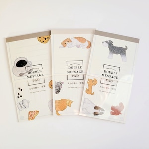 May include: Three double message pads with different animal illustrations. The first pad features a coffee cup and croissant, the second pad features a cat, and the third pad features a dog. Each pad has the text "Double Message Pad" and "大小2種の一筆箋" in Japanese.