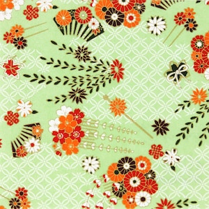 May include: A green fabric with a repeating pattern of white circles, gold vines, and red, orange, and black flowers. The flowers are arranged in bouquets and have a traditional Japanese design.