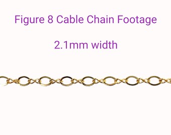 May include: Gold-toned figure 8 cable chain with a 2.1 mm width. The chain is made of small, oval-shaped links that are interlocked in a figure 8 pattern.