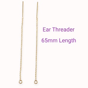 May include: A pair of gold ear threader earrings, each with a 65mm long chain and a small loop at the end. Ear Threader 65mm Length