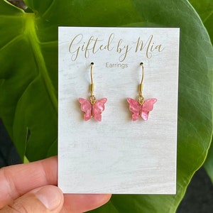 Roze vlinderoorbellen