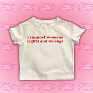 Puede incluir: Camiseta blanca con texto rojo que dice "i support womens rights and wrongs".