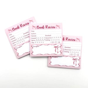 May include: Three square light pink sticky notes featuring the text Book Review at the top, decorated with small pink bows. Each note includes printed lines for title, author, dates, and rating sections for characters, spice, plot, and thoughts.
