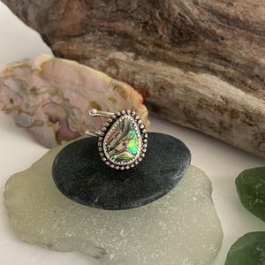 Handcrafted abalone ring. Silver abalone shell ring. Adjustable from size 5 to size 10.