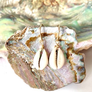 Gold Cowrie Shell Dangle Earrings. Cowrie Shell Dangle Earrings. Gold Earrings. Shell Earrings. Beachy Earrings. Gift.